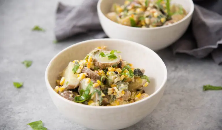Bowls of grilled corn and poblano potato salads.