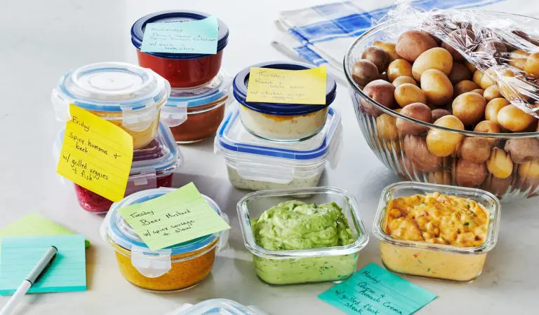 Labeled Tupperware containers with a bowl of the most delicious looking potatoes that have ever graced dishes.