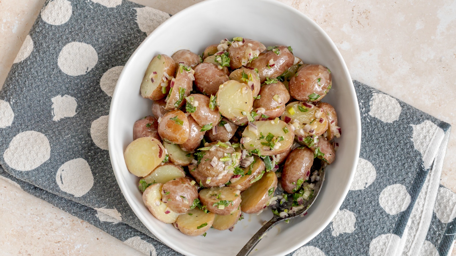 A bowl of French Potato Salad made with Little Reds™.