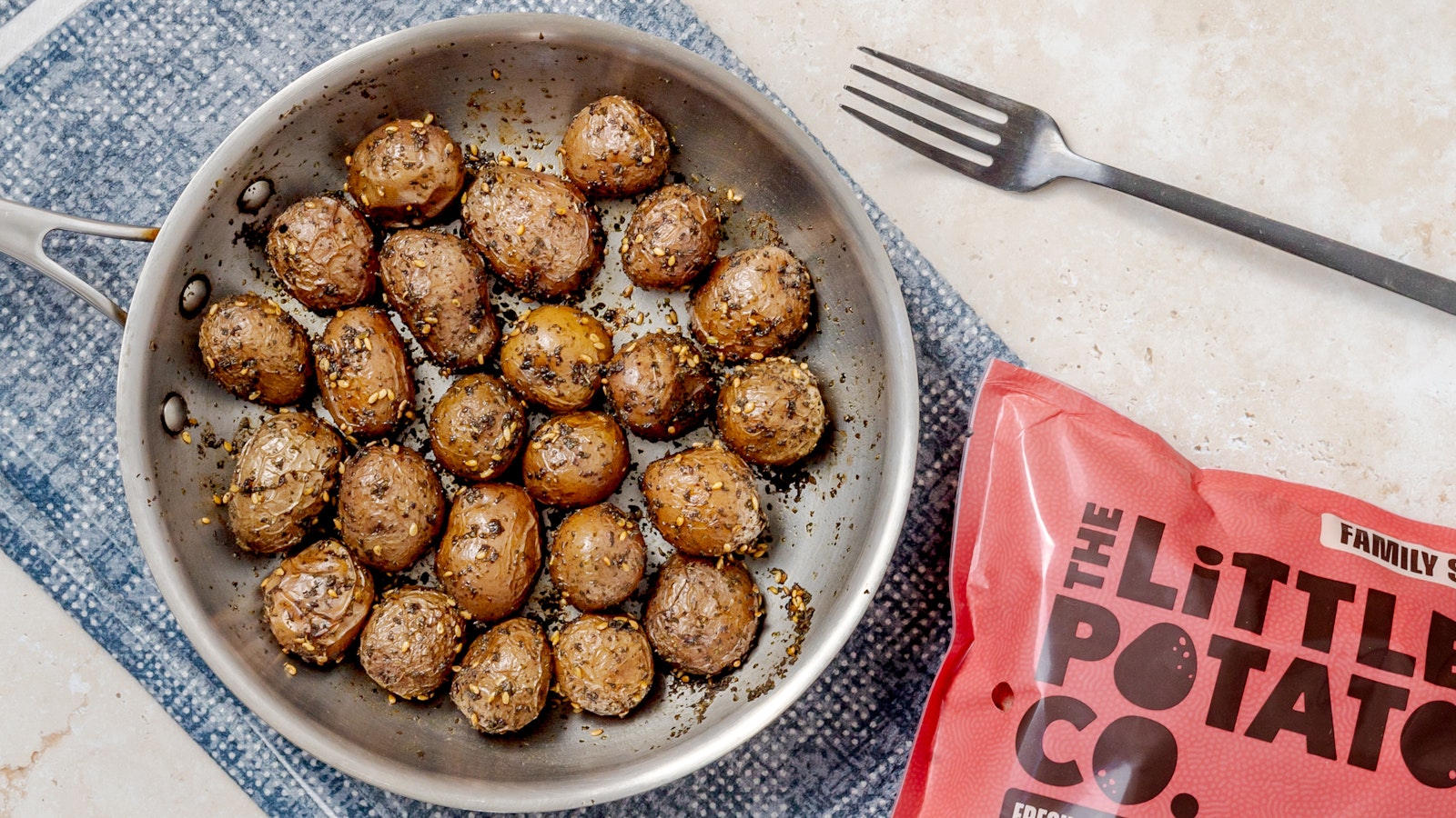 A bowl of slow roasted za'atar potatoes made with Little Reds™.