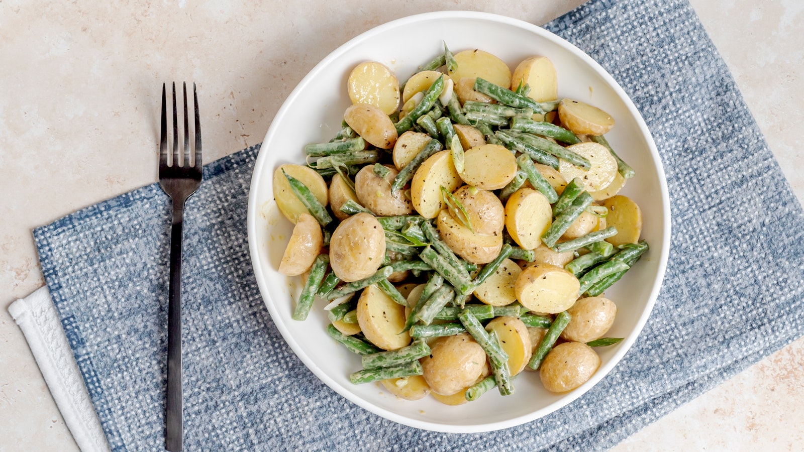 A green bean and Little Yellows® potato salad