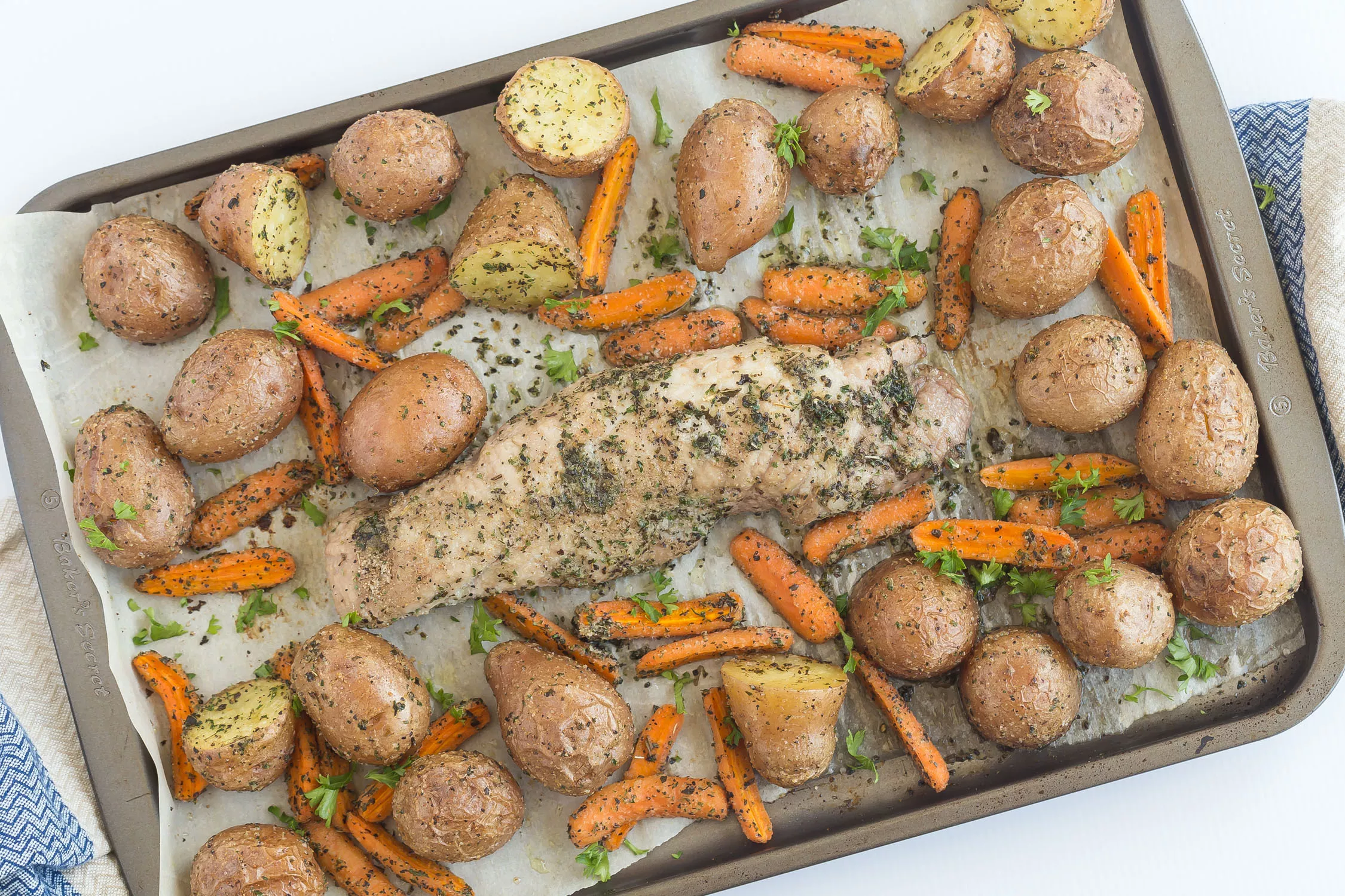 Pork tenderloin and vegetables sheet pan dinner.