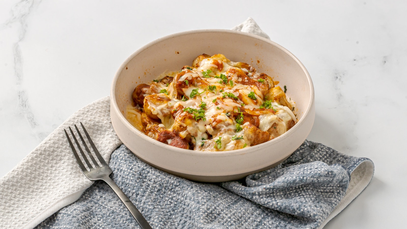 A bowl of delicious pizza-flavored Little Potatoes featuring Little Yellows™.