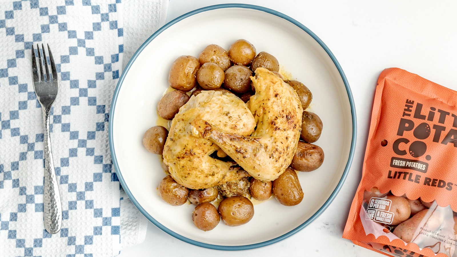 A plate of chicken leg quarters with Little Reds™.
