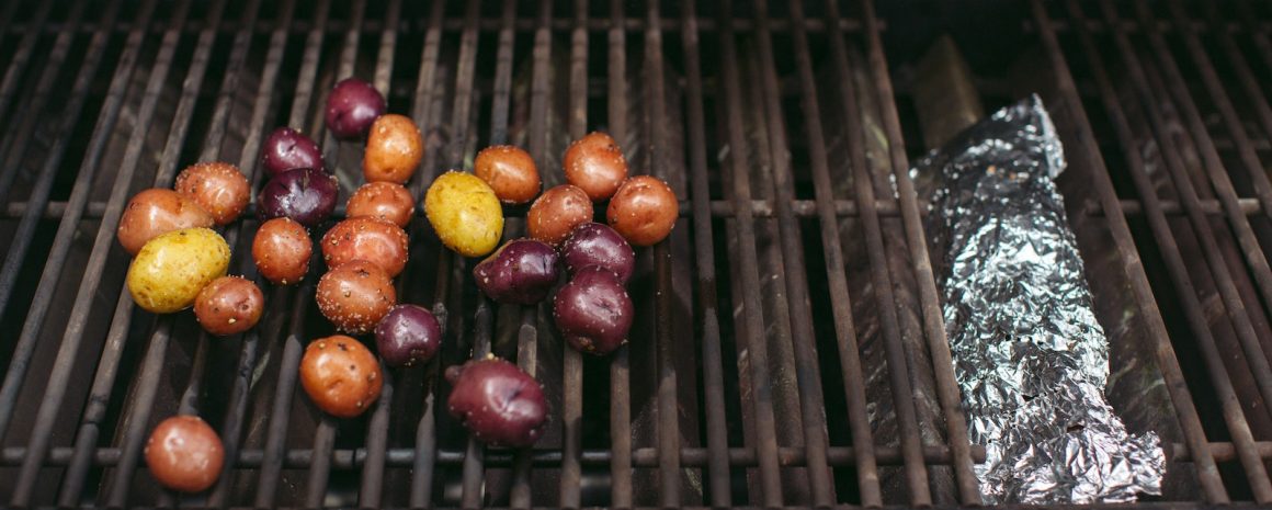Colorful little potatoes on the grill.
