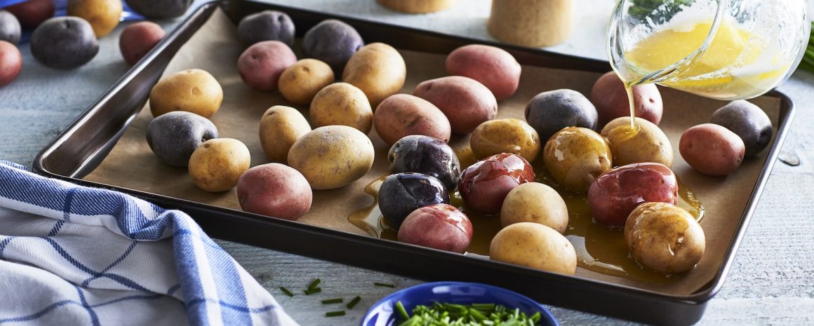 Baking sheet of little potatoes.