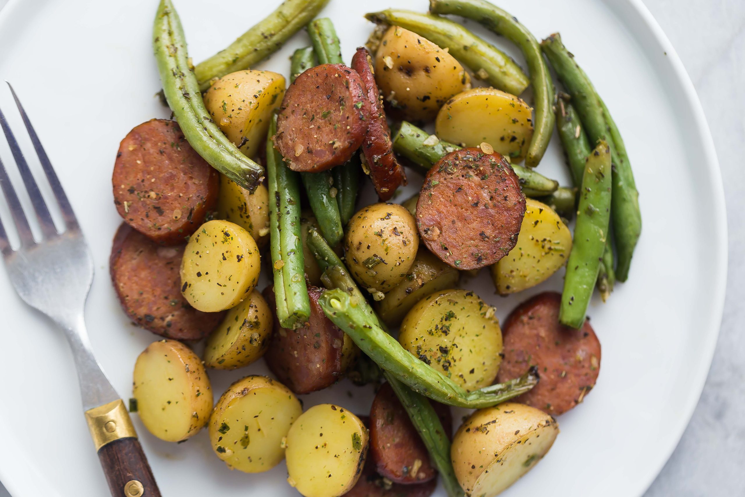https://www.littlepotatoes.com/wp-content/uploads/2019/08/One-Pan-Sausage-Potatoes-and-Green-Beans_Ashley-Fehr_Web-Res-5-scaled.jpg