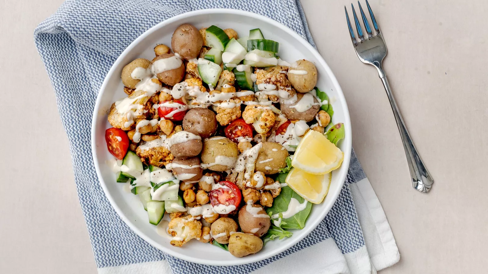 A bowl of meal prepped veggies and shawarma spices.