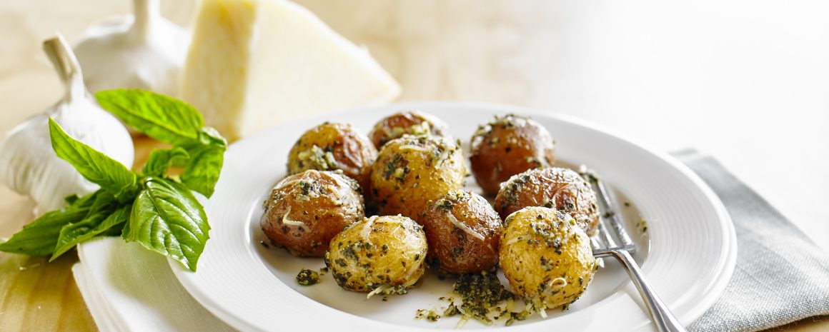 A plate of pesto Parmesan roasted potatoes.