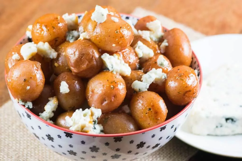 A bowl of buffalo wing little potatoes.