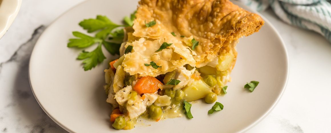 A slice of hearty chicken pot pie.