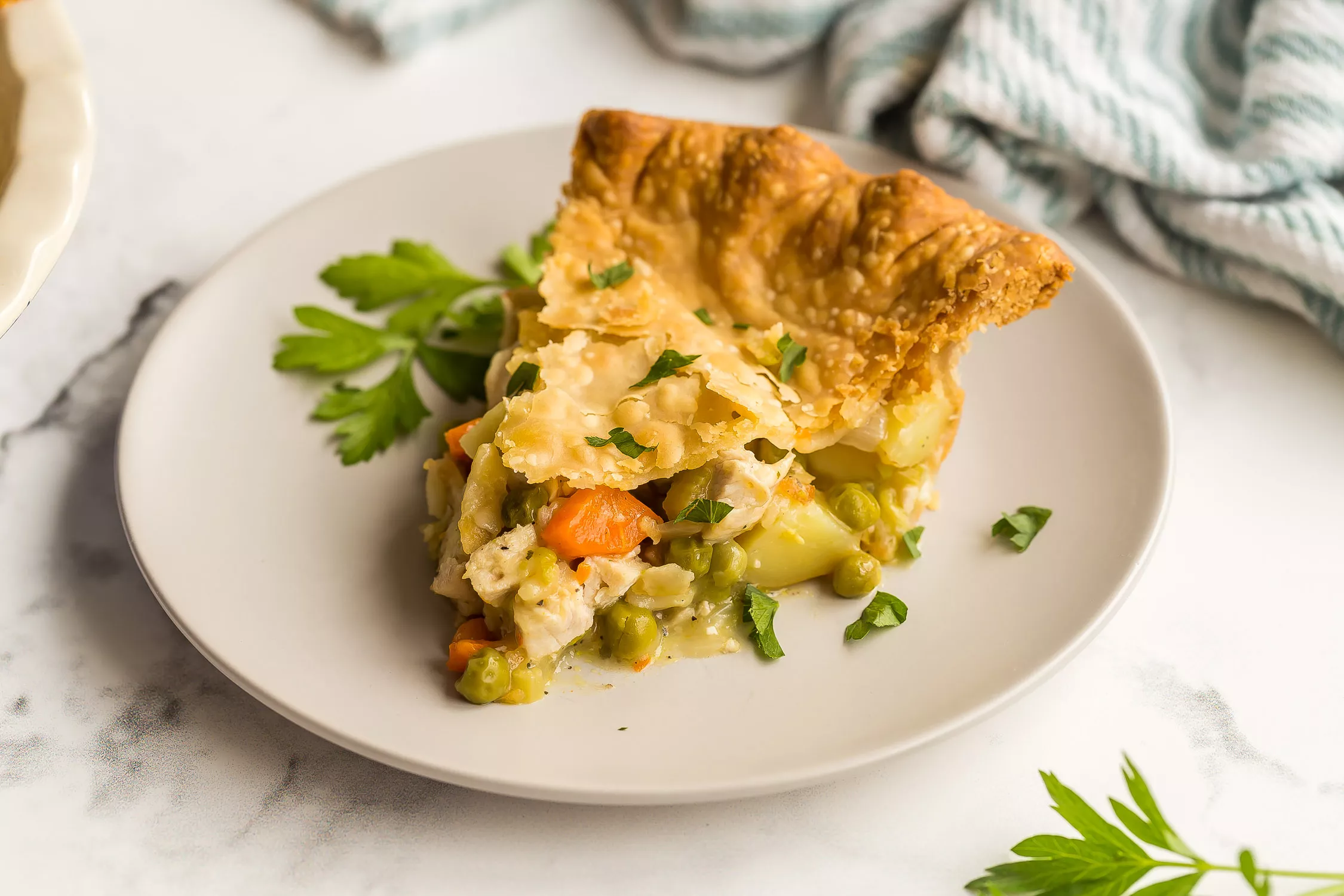 A slice of hearty chicken pot pie.