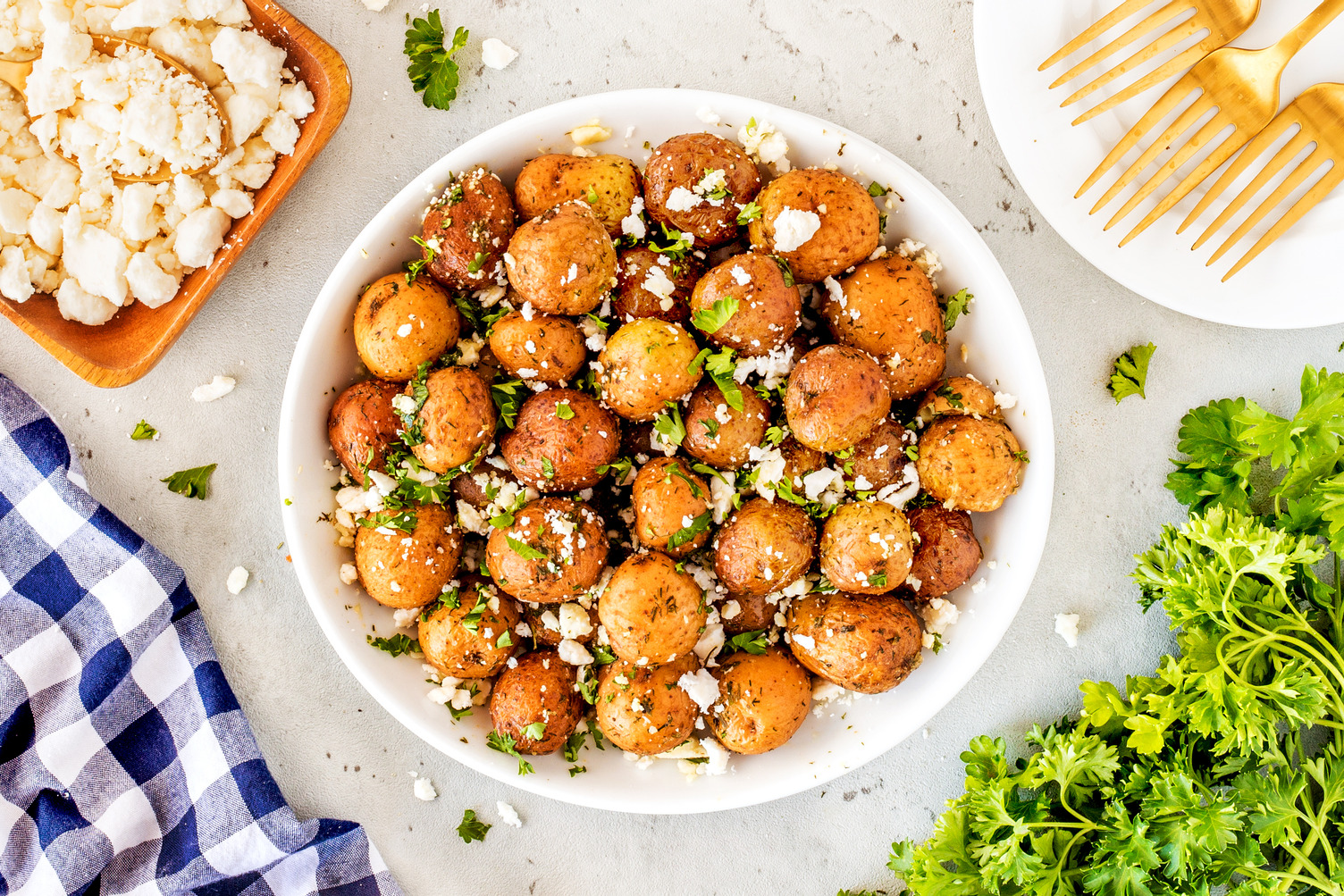 A bowl of Easy Lemon Feta Mediterranean Potatoes.