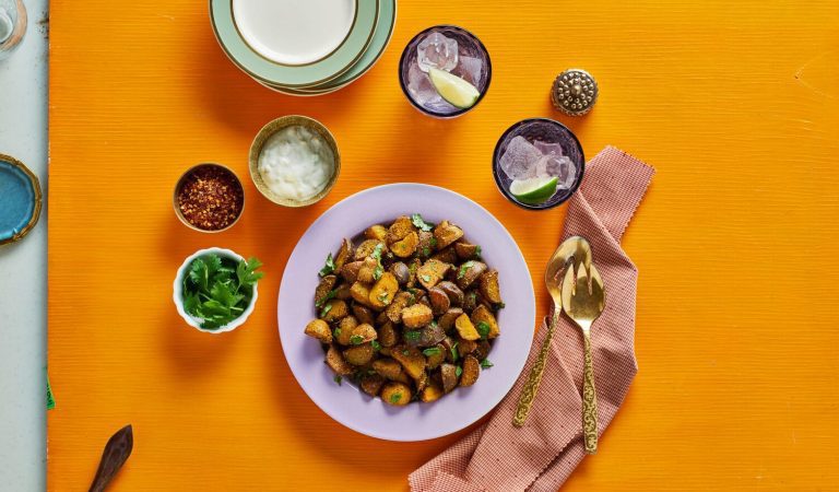 A bowl of garam masala and curry pan-fried potatoes.