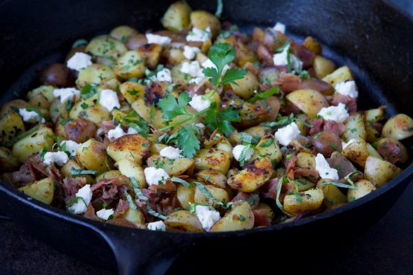 Healthy potato hash with prosciutto and goat cheese.