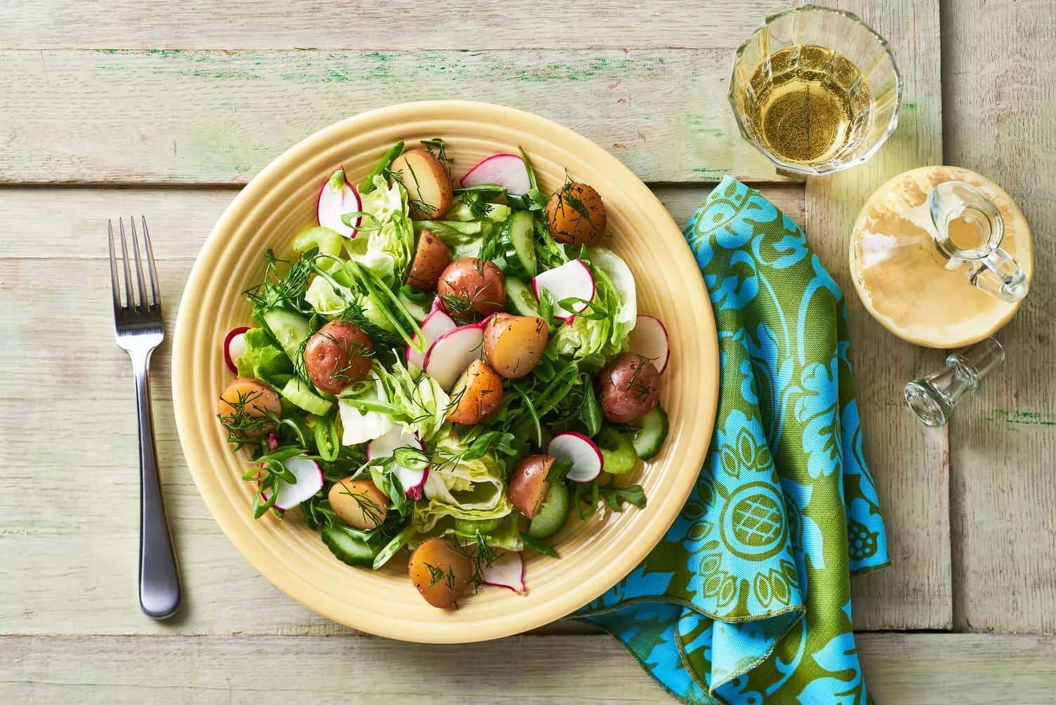 A mixed green salad with Dijon vinaigrette.