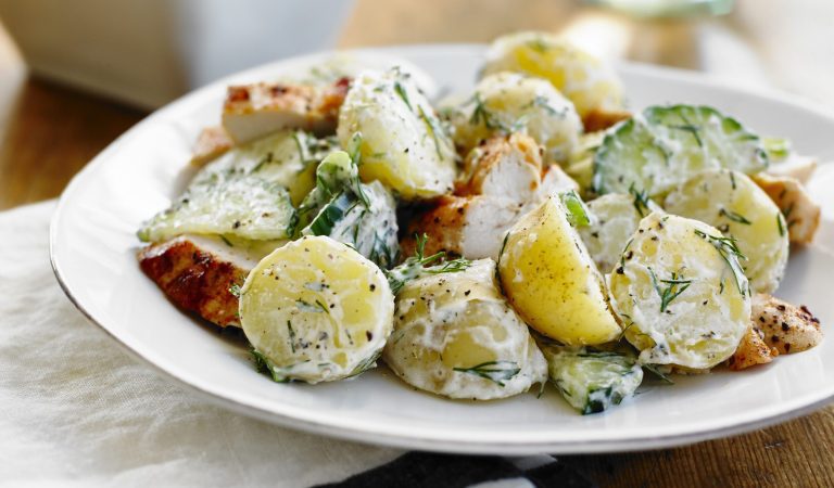 Chicken breast with creamy dill potatoes and cucumber salad.