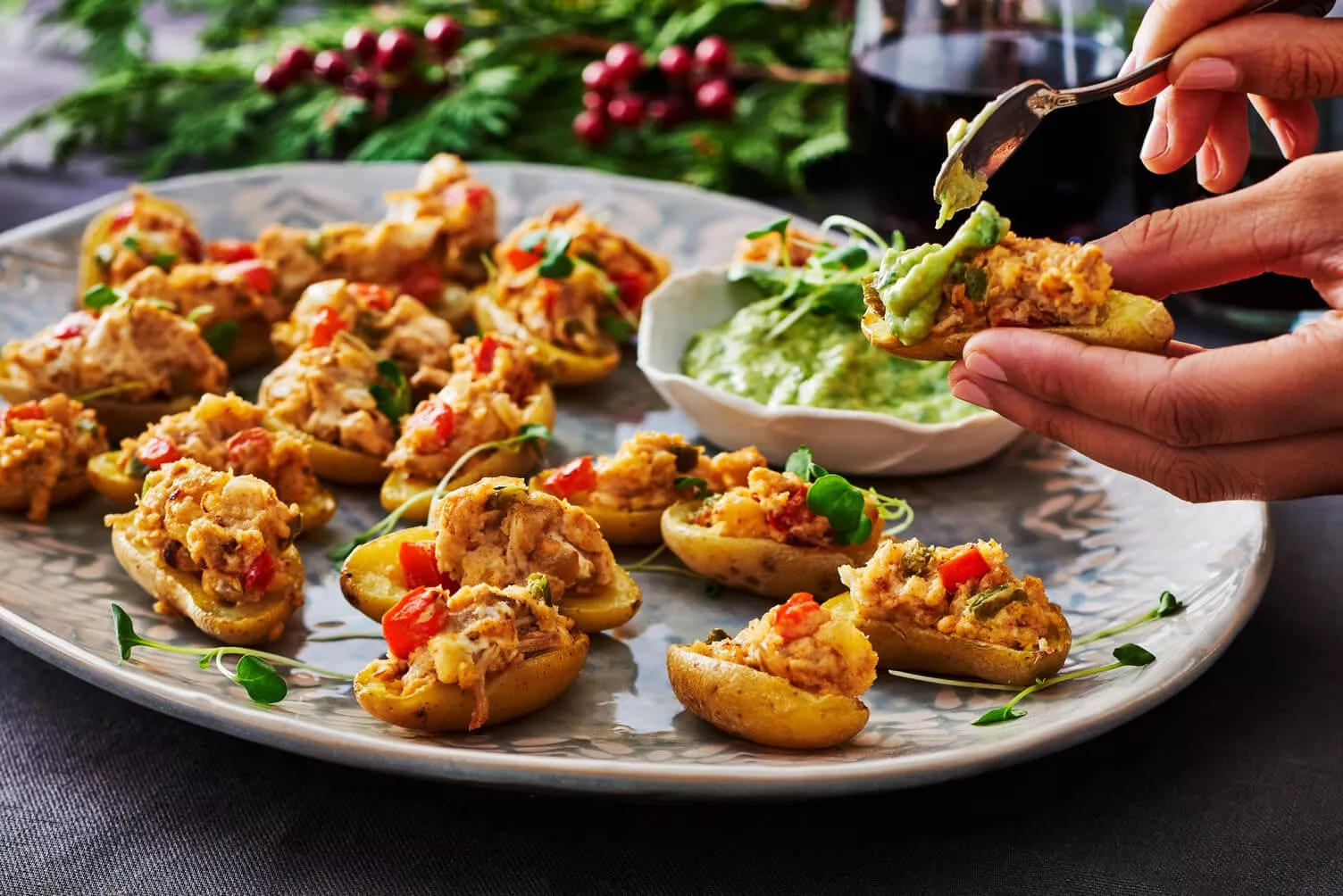 A plate of stuffed potato caps with turkey leftovers.