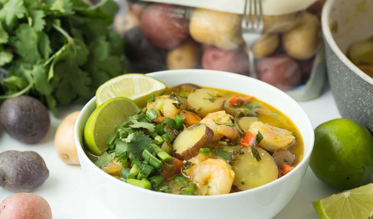 A bowl of curry soup with Thai chilies made with Little Duos™.