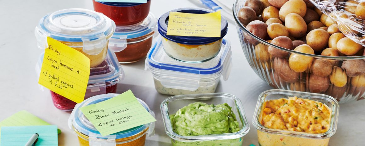 Labeled Tupperware containers with a bowl of the most delicious looking potatoes that have ever graced dishes.