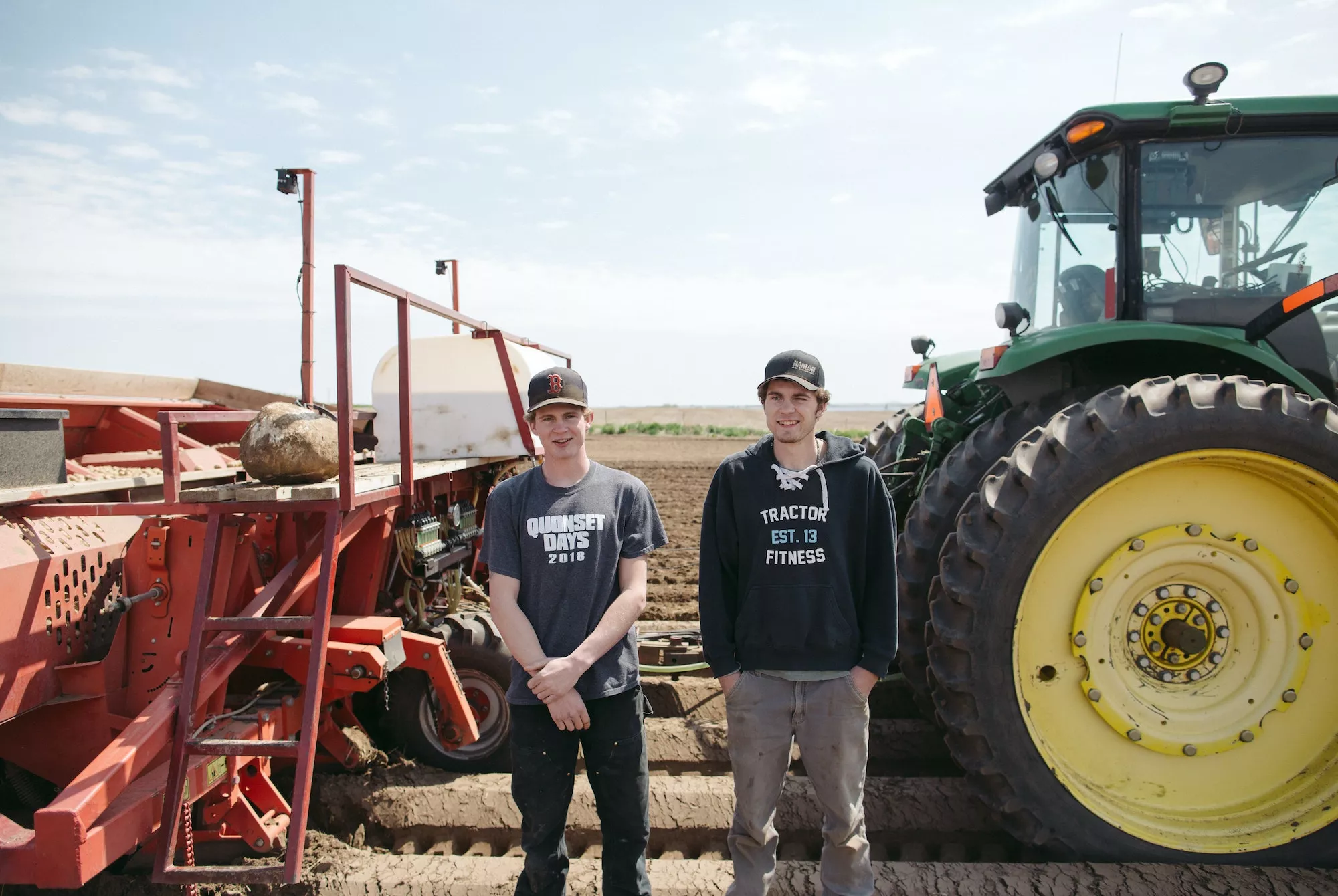 Farmer Profiles_Niek and Ton Niek and Ton in front of their tractors.