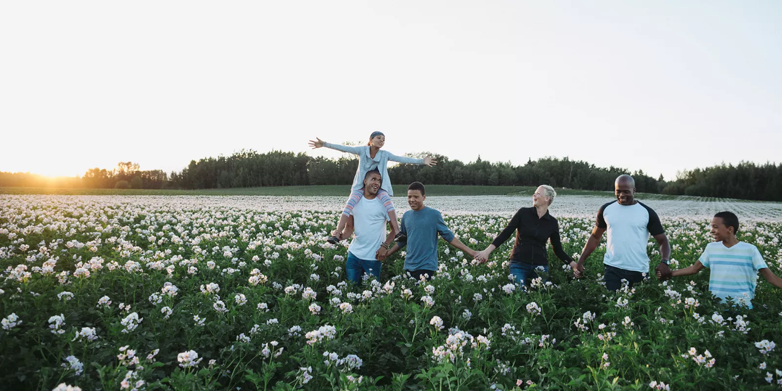 Angela and her family in the field.