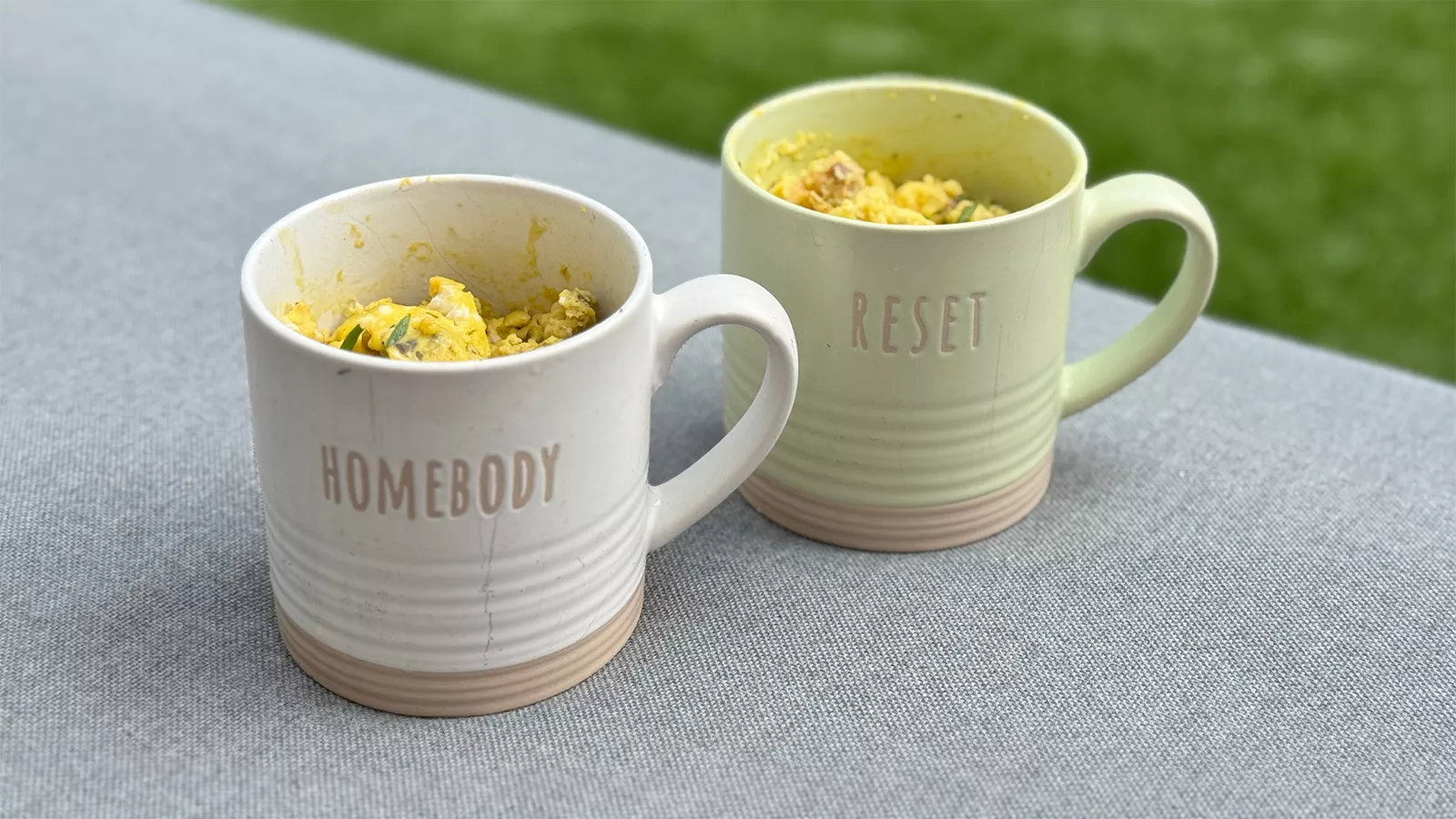 Two mugs full of a delicious egg and Little Potato breakfast.
