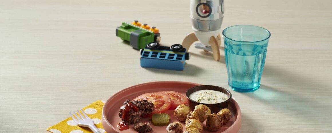 A plate of air fried Little Potatoes with ranch dip.