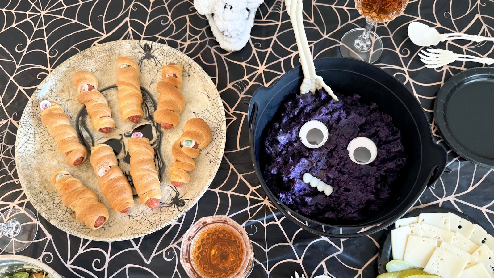 A bowl of spooky mashed potatoes with googly eyes made with Little Purely Purples™.