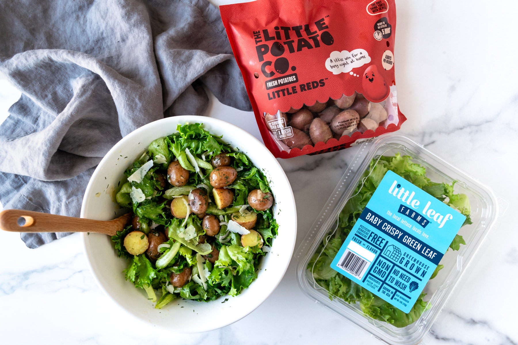 A Lemon Herb Potato Salad made with Little Reds™ and Baby Crispy Green Leaf Lettuce.