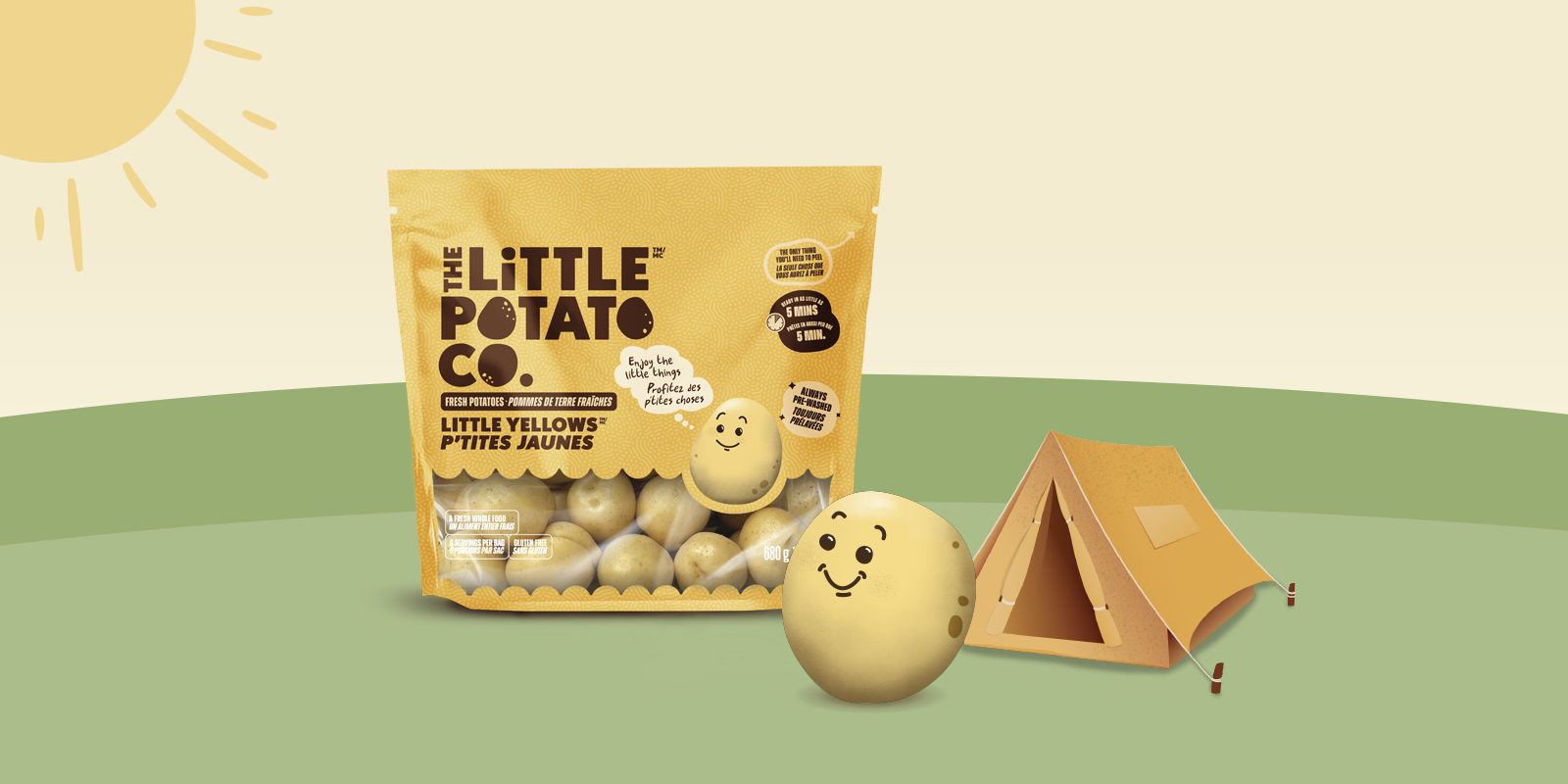 A little yellow Spuddie in front of a tent and a bag of Little Potatoes.