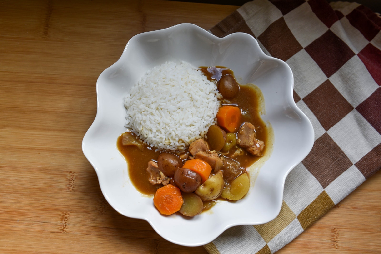 A plate of Japanese chicken curry with Little Potatoes.